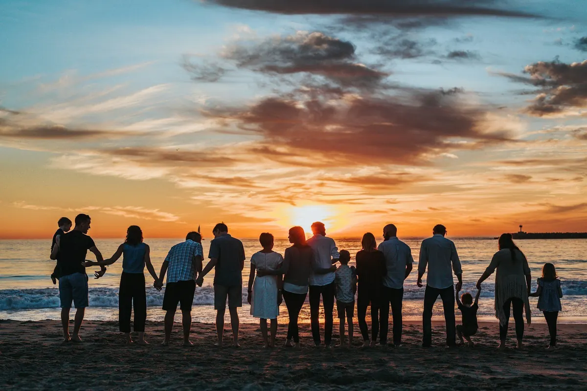 A family standing together at sunset — family law in Trinidad and Tobago