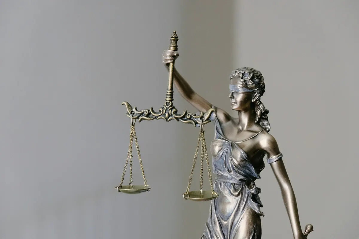 The scales A figure of Lady Justice holding her scales