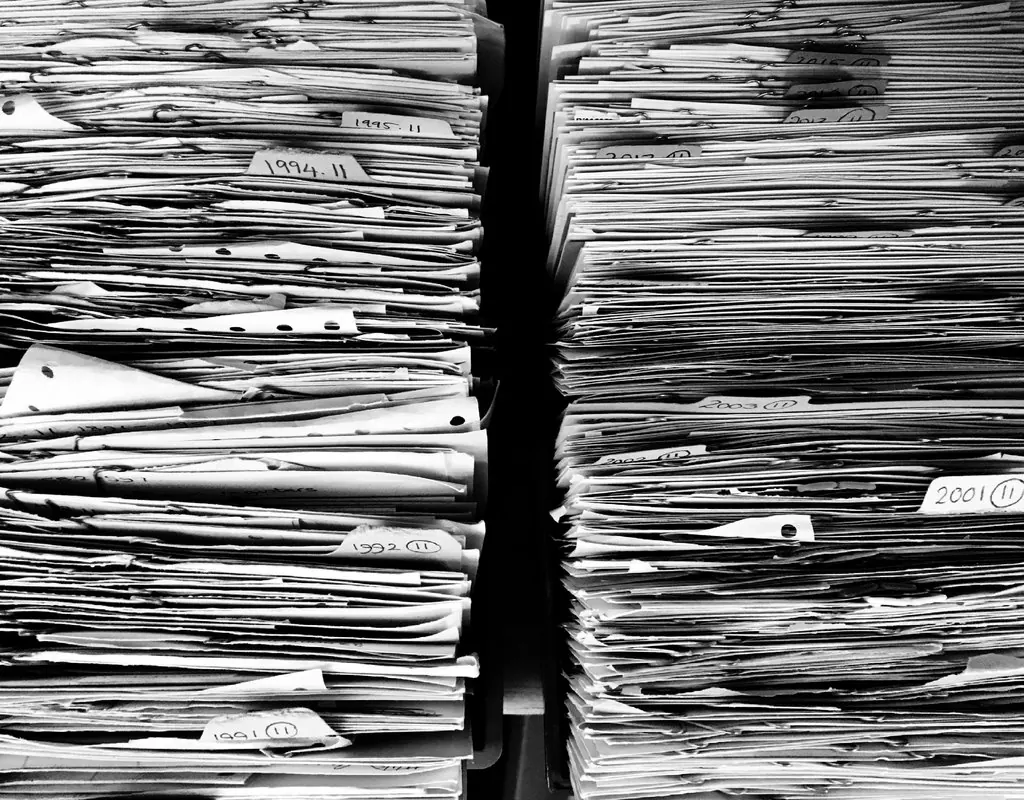 Stacks of case files tied and shelved